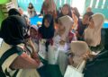 Berbagi Kebahagiaan Ramadan, Program EVP PLN Peduli Berikan Alat Tulis dan Al Qur’an